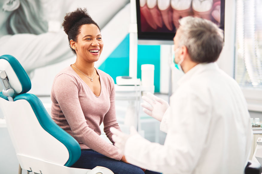 Dentist Consulting A Patient