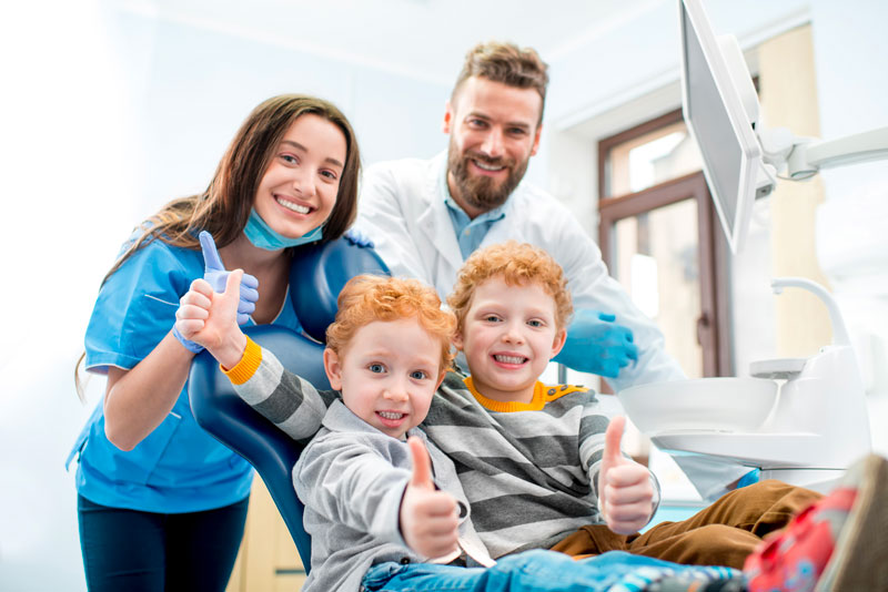 Happy Children At Dentistry