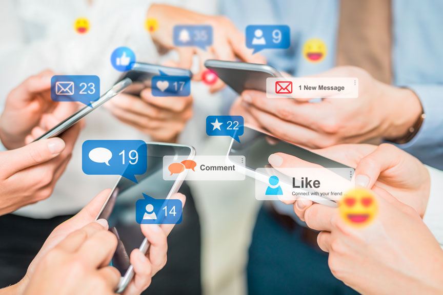 Hands Holding Smartphones With Social Media Icons