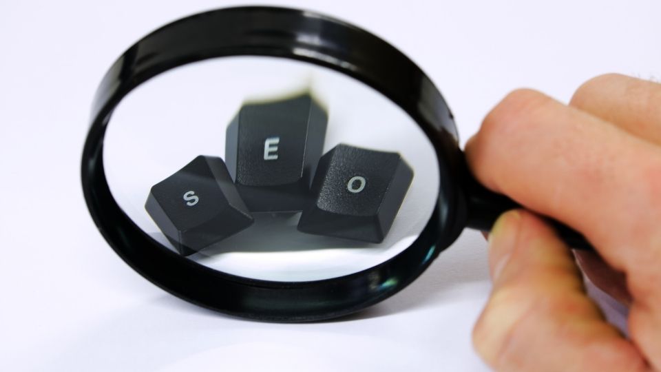 Magnifying Glass Over SEO Keys