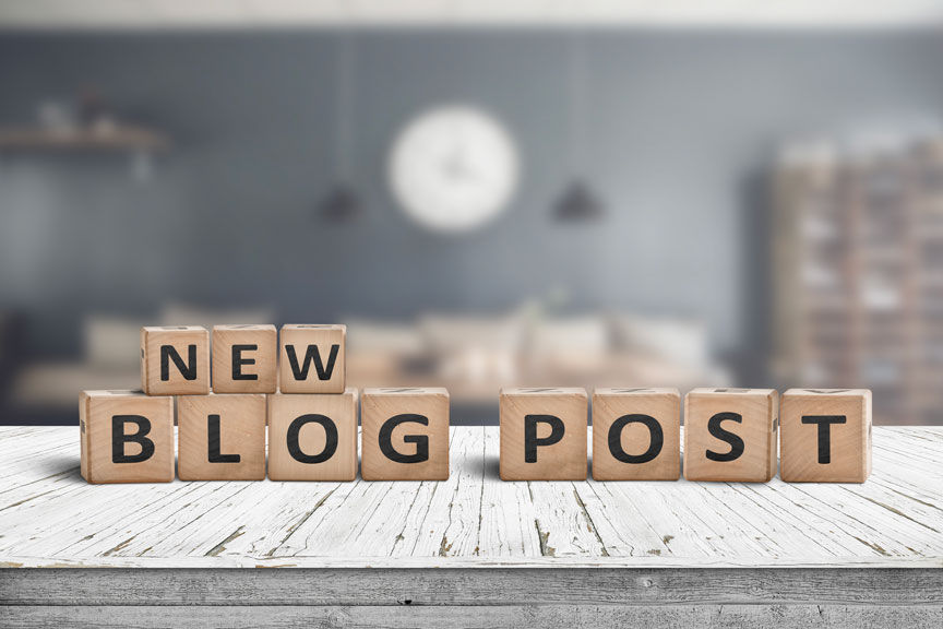 Wooden Blocks Spelling New Blog Post