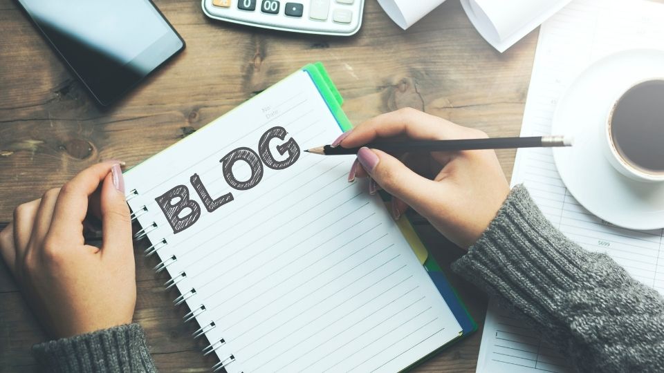 Person About To Write A Blog In Notebook