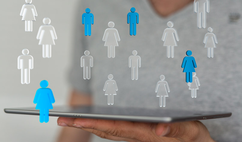 Hand Holding A Tablet With A Patient Group Illustration